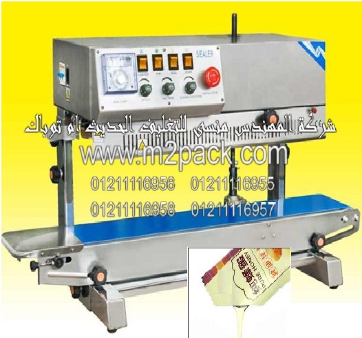 الة تعبئة وتغليف العصير نصف اتوماتيك من انتاج شركة ام توباك