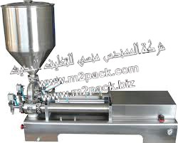 ماكينة تعبئة المواد اللزجة العمودية  , ماكينة تعبئة المواد السائلة التي تعمل بضغط الهواء موديل 404 ام تو باك ماركة المهندس منسي